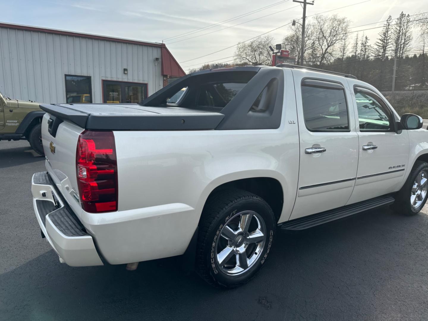 2011 White /BLACK Chevrolet Avalanche (3GNTKGE31BG) with an 8 engine, automatic transmission, located at 8464 Route 219, Brockway, PA, 15824, (814) 265-1330, 41.226871, -78.780518 - WOW...just traded in 2011 Chev Avalanche LTZ with leather, power/heated/cool seats, sunroof, DVD, hitch, and ONLY 64000 miles. Serviced and ready to go. Hard to find and we have the right one. - Photo#13